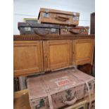 THREE LEATHER ATTACHE CASES TOGETHER WITH TWO LEATHER SUITCASES