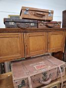 THREE LEATHER ATTACHE CASES TOGETHER WITH TWO LEATHER SUITCASES