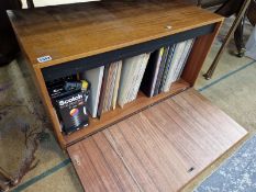 A TEAK RECORD CABINET AND RECORDS.