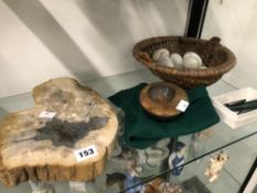 A SECTION OF FOSSILISED TREE, A BASKET OF CERAMIC EGGS , ETC.