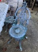A SET OF FOUR PAINTED CAST ALLOY PATIO CHAIRS.