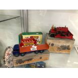 A BOXED DINKY TOY CATERPILLAR TRACTOR, A FODEN FLAT BED TRUCK AND A CORGI OPEN TOPPED DOUBLE