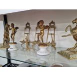 A PAIR OF BRASS HORSES, A PAIR OF BRASS CUPIDS TOGETHER WITH FOUR BRASS PLATE STANDS