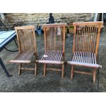 THREE MATCHING TEAK FOLDING GARDEN CHAIRS