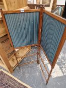 A MAHOGANY AND PLEATED DARK GREEN SILK TWO FOLD FIRE SCREEN