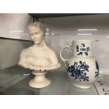 A FIRST PERIOD WORCESTER BLUE AND WHITE MASK JUG TOGETHER WITH A PARIAN BUST OF THE CLYTIE