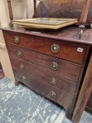 A SMALL MAHOGANY CHEST OF FOUR DRAWERS.