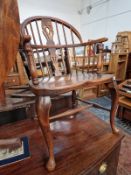 AN ANTIQUE WINDSOR ARMCHAIR, TOGETHER WITH A LANCASHIRE ROCKING CHAIR.