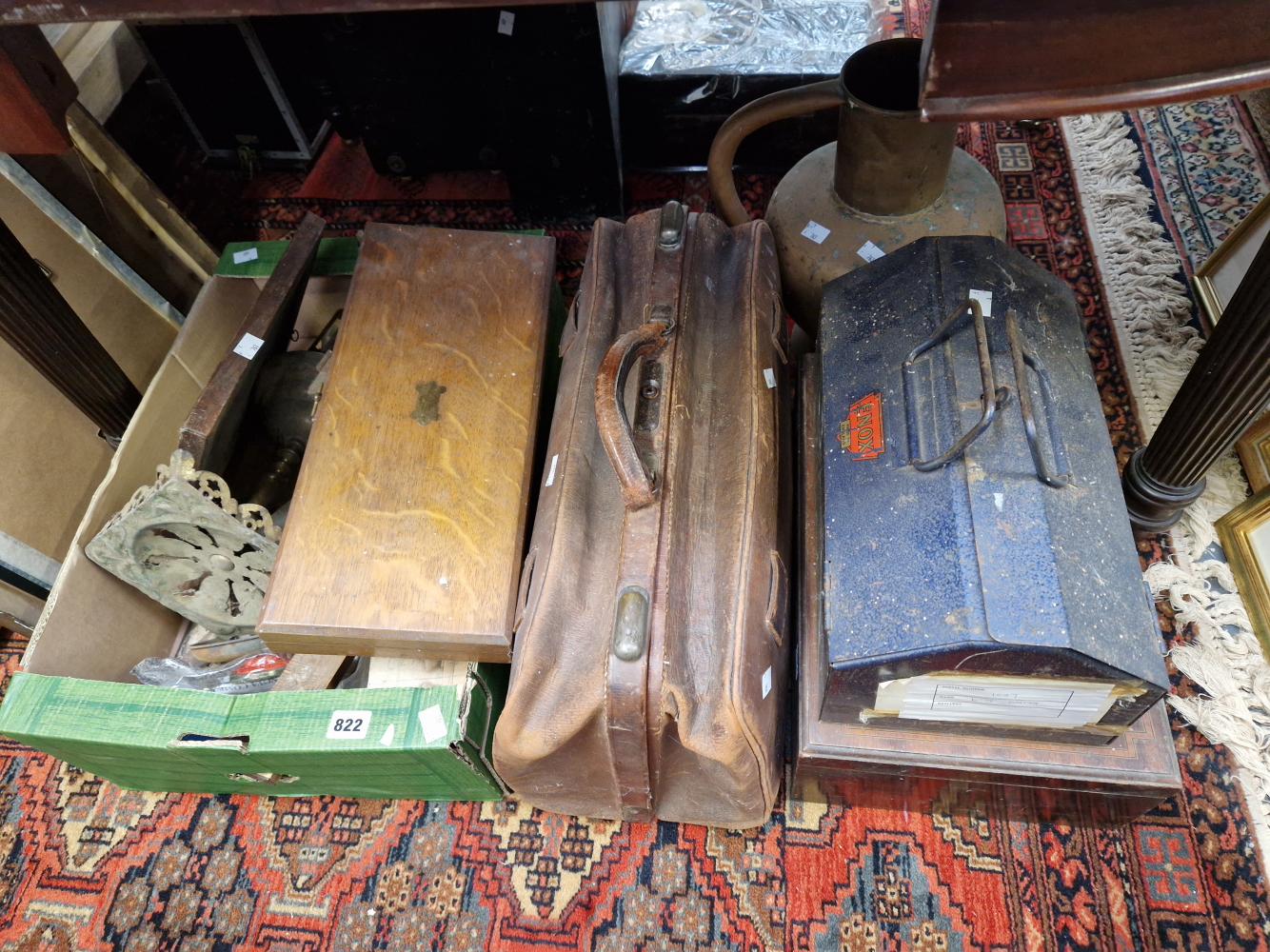 A CUTLERY CANTEEN, AN OAK CASED CARVING SET, A GLADSTONE BAG, A BRASS TRIVET AND JUG, A METAL TOOL