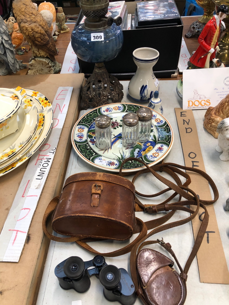 AN OIL LAMP, THREE SILVER TOPPED DRESSING TABLE BOTTLES, A PAIR OF ZEISS OPERA GLASSES, A LEATHER