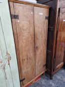 AN INTERESTING ANTIQUE VERNACULAR COUNTRY MADE TWO DOOR CABINET. 188 X 85 X 43CMS.