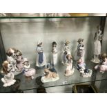 A COLLECTION OF THIRTEEN NAO AND LLADRO FIGURINES