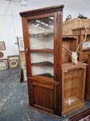 A 19th C. STAINED PINE FLOOR STANDING CORNER CABINET. 210 X 85 X 59CMS.