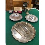 TWO HALLMARKED SILVER TROPHY CUPS, A PAIR OF ARTS AND CRAFTS SILVER DISHES, A SMALL SALVER, TWO