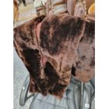 A LADYS FAUX FUR BROWN OVER COAT