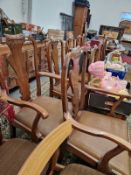 A SET OF TEN QUEEN ANNE STYLE MAHOGANY DINING CHAIRS.