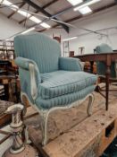 A PAIR OF FRENCH PAINTED SHOW FRAME SALON ARMCHAIR.