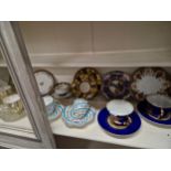 A COLLECTION OF CABINET CUPS AND SAUCERS