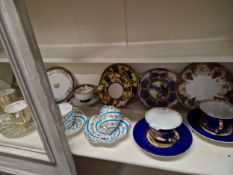 A COLLECTION OF CABINET CUPS AND SAUCERS