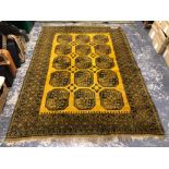 AN AFGHAN RUG. 242 x 173cms