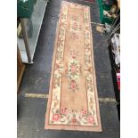 AN AUBUSSON DESIGN RUNNER. 310 x 76cms