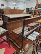 AN ANTIQUE SCHOOL DESK WITH INTEGRAL SEATS.