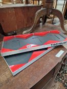 TWO ALUMINIUM AND RED PERSPEX TRAYS LABELLED TAGHEUER