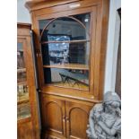 A LARGE 19th C. OAK GLAZED TOP TWO PART CORNER CABINET.