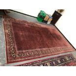 AN OLD ORIENTAL PERSIAN DESIGN CARPET. 402 x 246cms