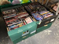 FOUR BANANA BOXES OF DVDS