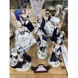 NINE ROYAL DUX PORCELAIN FIGURES AND A TRADE SIGN FOR THEM