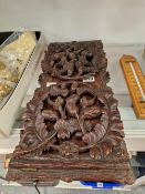 A MAHOGANY BOOK SLIDE, THE ENDS PIERCED AND CARVED WITH BUDS AMONGST FOLIAGE