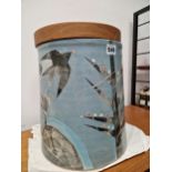 A WOODEN LIDDED BLUE GROUND POTTERY VESSEL DECORATED WITH BIRDS AND TREES