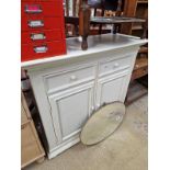 A PAINTED SIDE CABINET ON SQUAT BUN FEET. 101 X 111 X 45CMS.