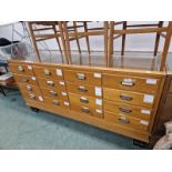 A SIXTEEN DRAWER HABERDASHERY CABINET. 180 X 92 X 58CMS.