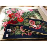 A CHINESE SILK NEEDLE WORK FLORAL SCROLL TOGETHER WITH A BLUE GROUND WOOL BELL PULL PANEL WORKED