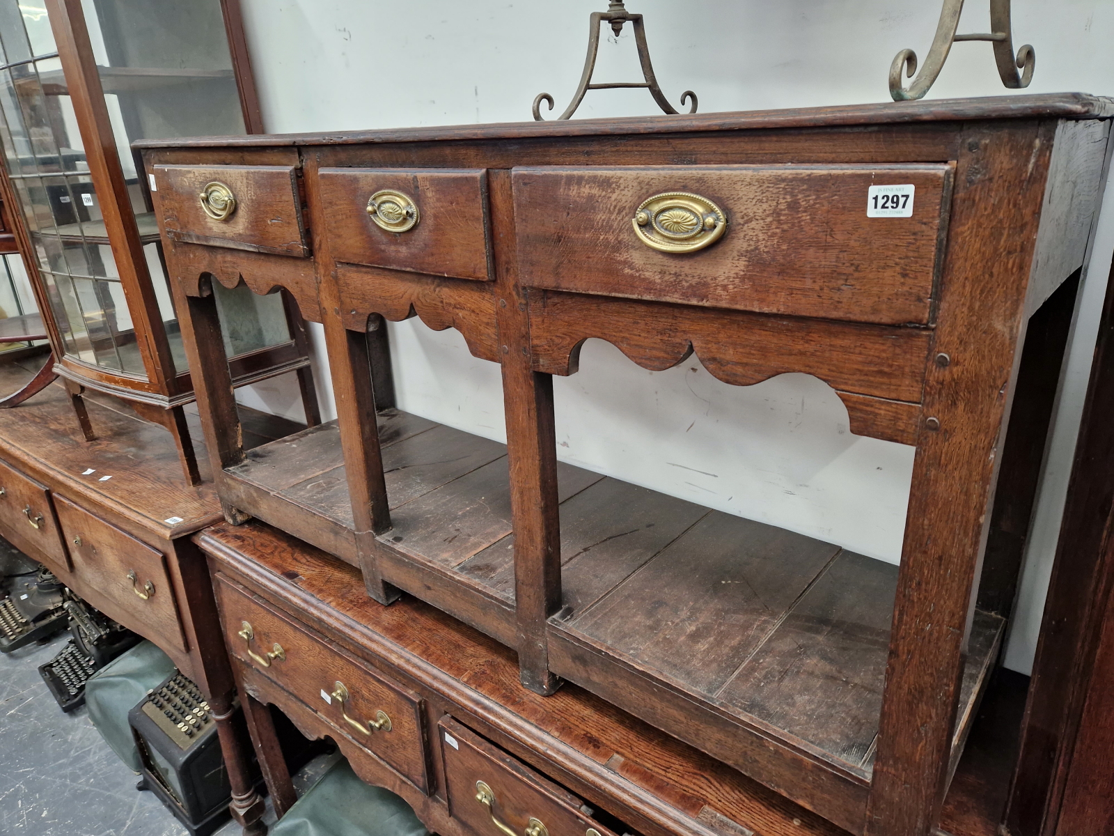 A GEORGIAN AND LATER OAK SMALL THREE DRAWER POT BOARD DRESSER BASE. 72 X 134 X 42CMS.