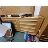 A PAIR OF OAK EIGHT DRAWER CHESTS.