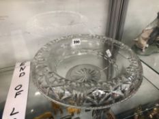 A CUT GLASS BOWL WITH TURNOVER RIM