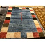 AN INTERESTING TRIBAL CARPET. 285 x 226cms