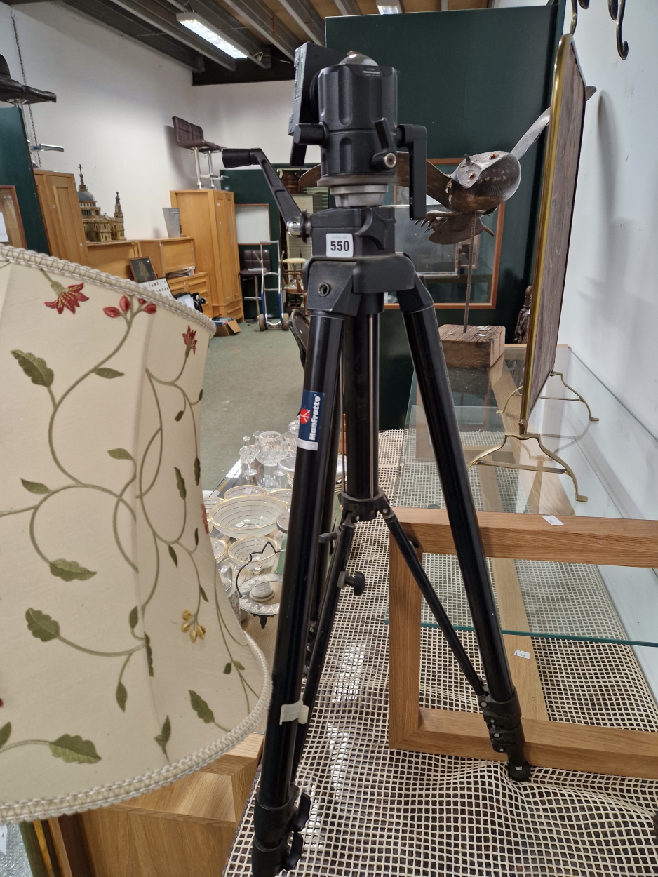 A MANFROTTO PROFFESIONAL CAMERA TRIPOD