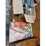 A SCALEXTRIC GRANDE BRIDGE, BOXED CARS, A TRACK SIDE BUILDING, TWO ELECTRIC TRANSFORMERS, ETC.
