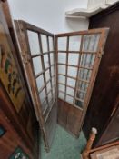 AN ANTIQUE PART GLAZED FOUR FOLD SCREEN.