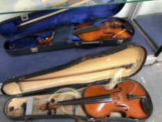 TWO CASED VIOLINS AND BOWS