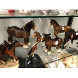 SEVEN CERAMIC HORSES BY TRENTHAM AND OTHERS