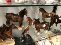 SEVEN CERAMIC HORSES BY TRENTHAM AND OTHERS