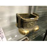 AN ORIENTAL POLISHED BRONZE TWO HANDLED CENSER