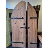 A GOTHIC ARCHED PINE DOOR.