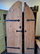 A GOTHIC ARCHED PINE DOOR.