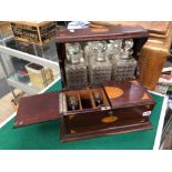 AN EDWARDIAN MAHOGANY AND INLAID TANTALUS.